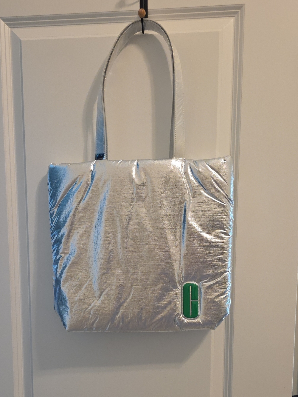 Silver Metallic Clinique Tote Bag With Green Inside. Snap Closure
